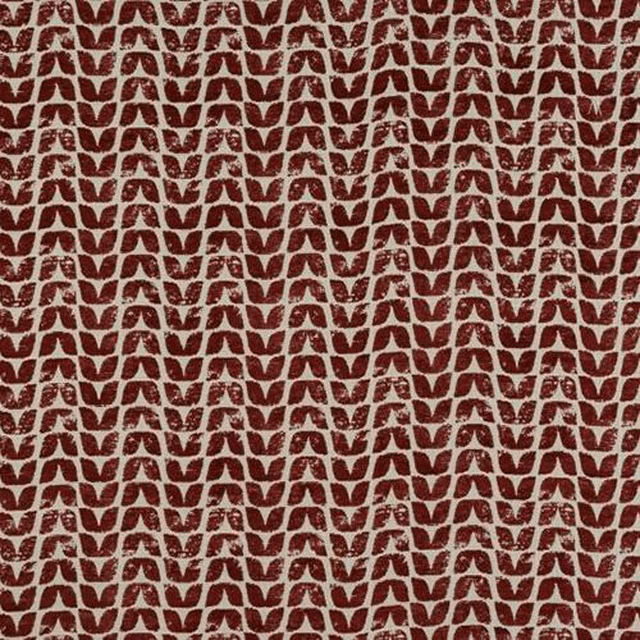 Small repeating brick red geometric motif on a light textured fabric ground