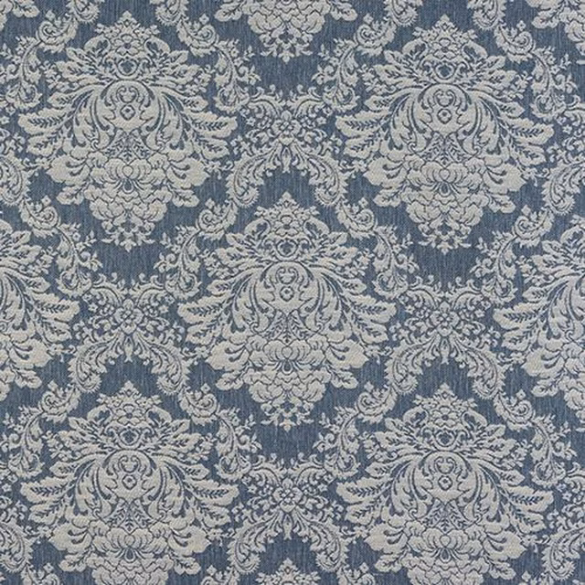 Blue-grey damask fabric with pale ornate floral motifs on a textured weave
