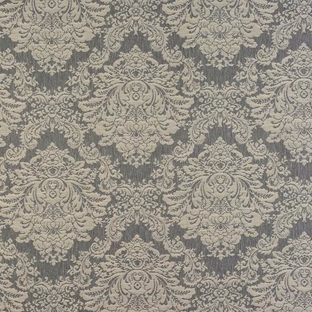 Silver-grey damask fabric with ornate scrolling motifs on a woven ground