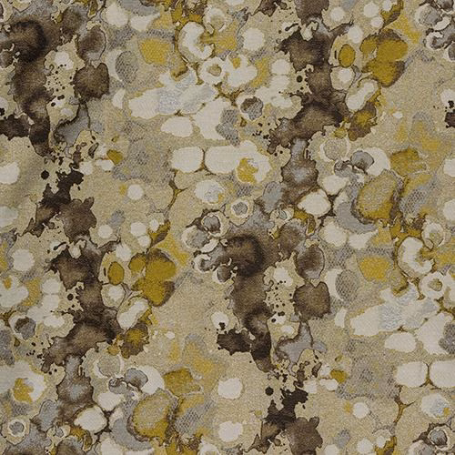 Abstract ochre and ivory patterned fabric with brown mottled accents and textured weave
