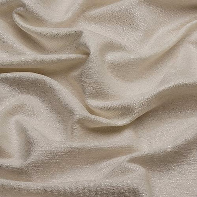 Warm ivory cream fabric with a soft lustre and fine textured weave