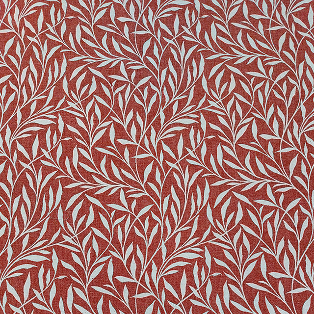 Russet red fabric swatch with trailing ivory leaf pattern