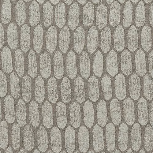 Close-up of silver-grey geometric woven fabric with elongated oval motifs