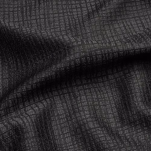 Close-up of charcoal grey woven fabric with a fine textured check pattern and soft folds.