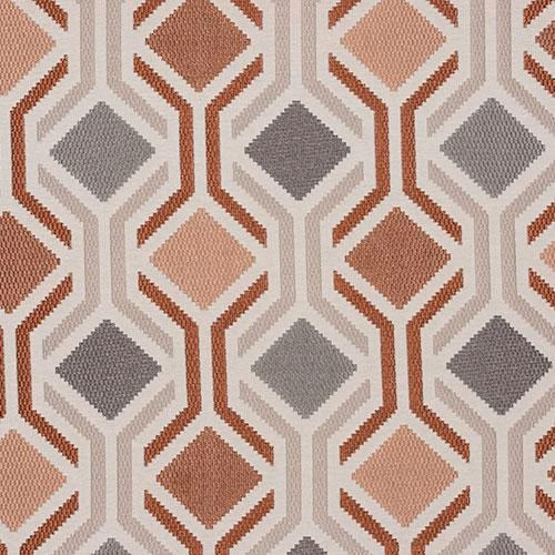 Geometric hexagon fabric swatch in burnt orange, taupe, grey and cream