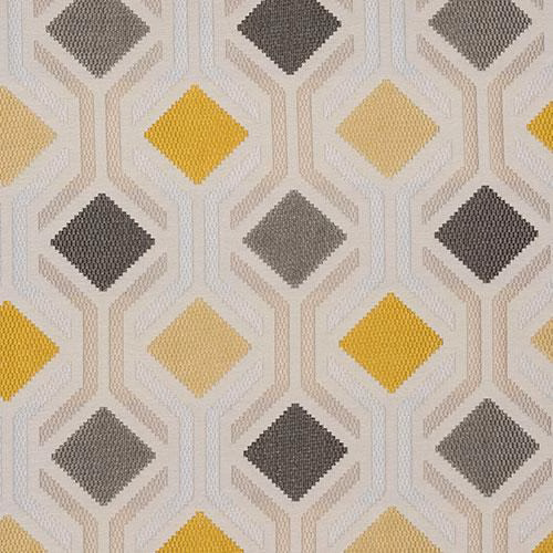 Geometric diamond fabric in ochre yellow, grey and ivory on a pale ground