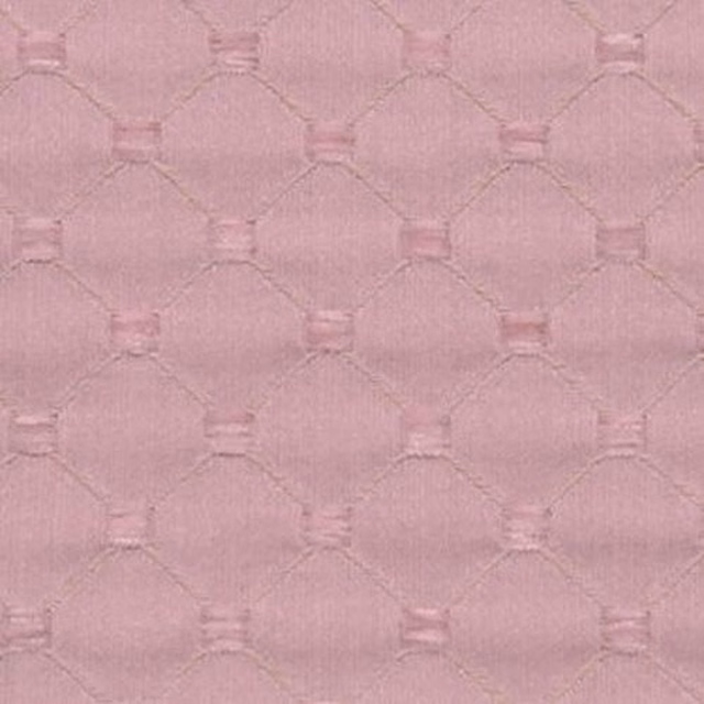 Soft dusty pink geometric fabric with a subtle raised linked pattern