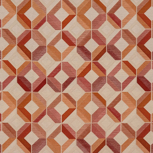 Geometric fabric swatch in terracotta, coral and cream diamond motifs
