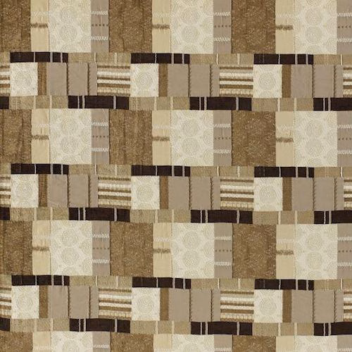 Geometric beige and taupe fabric swatch with brown bands and woven circular motifs