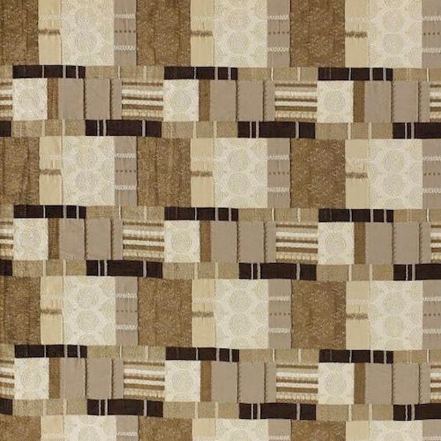 Geometric beige and taupe fabric swatch with brown bands and woven circular motifs