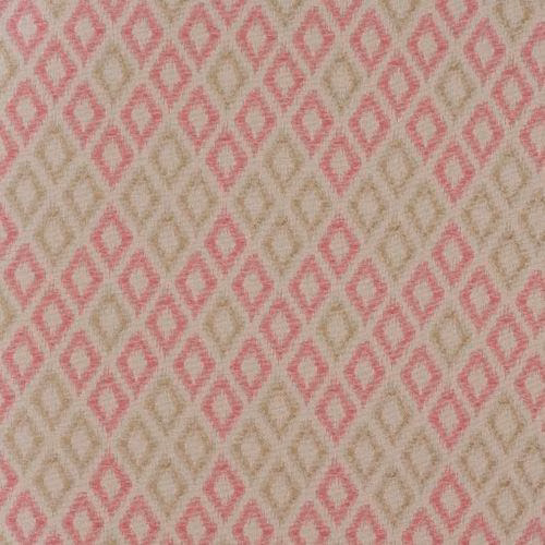 Pink diamond geometric fabric on a warm beige ground, shown as a close-up swatch.