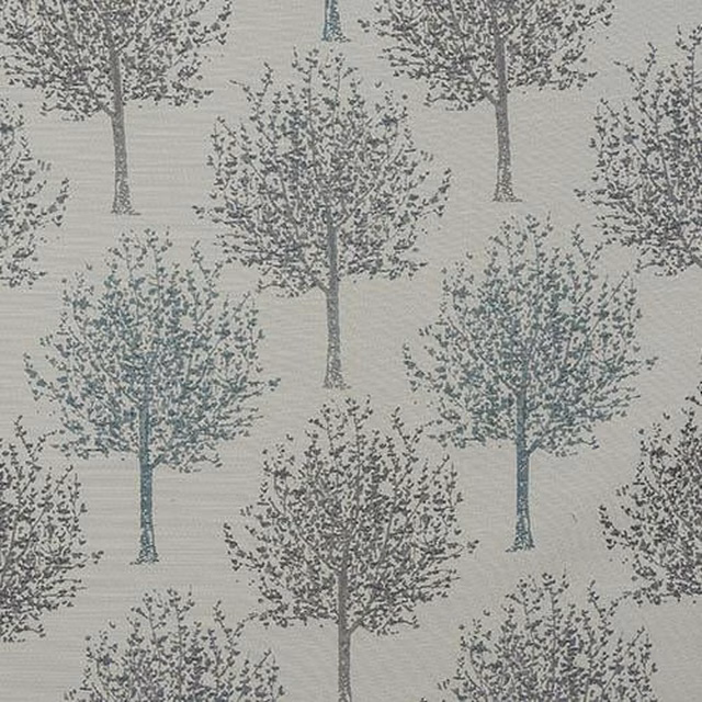 Muted teal tree motif on a pale textured fabric ground