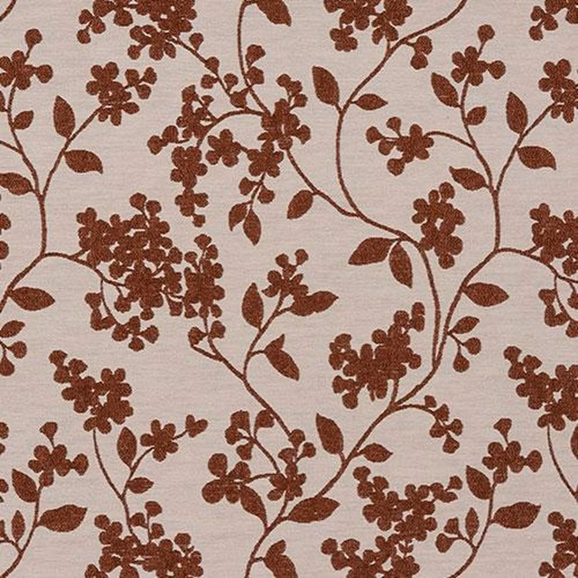 Burnt orange floral vine print on a cream woven fabric background