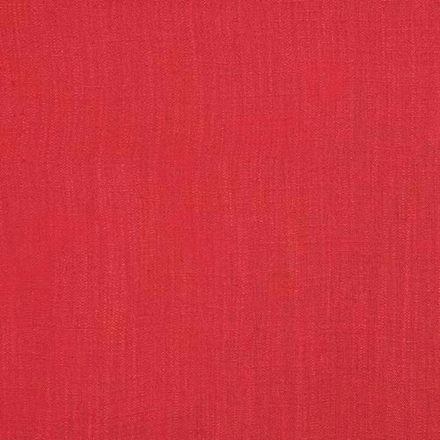 Bright coral pink plain woven fabric with fine linen texture