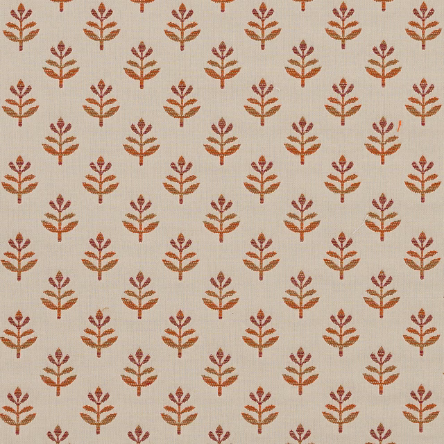 Pale ground fabric with small burnt orange leaf motif repeat