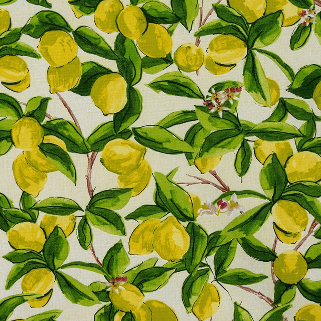 Painterly yellow lemons and green leaves on a pale ground