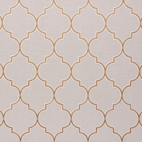 Pale woven fabric with a burnt orange quatrefoil trellis pattern