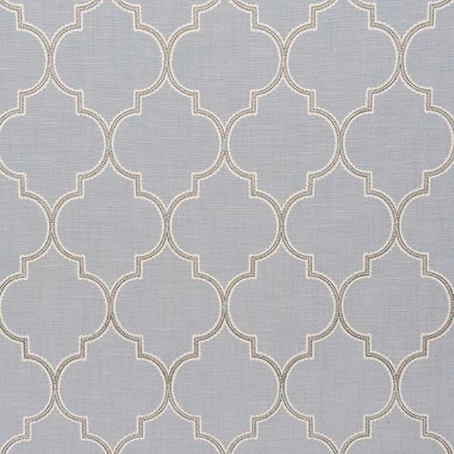 Pale seafoam-grey geometric fabric with repeating arched trellis motif