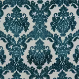 Teal damask upholstery fabric on an ivory ground with a plush textured look
