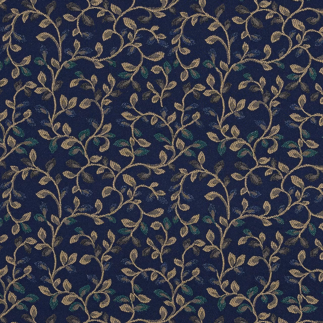Close-up of navy fabric with gold trailing leaf pattern and teal accents