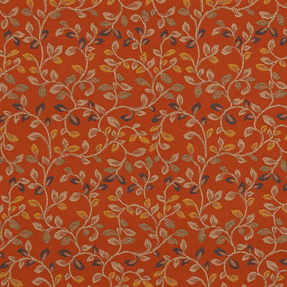 Terracotta woven fabric with trailing leaf motif in cream, gold and navy