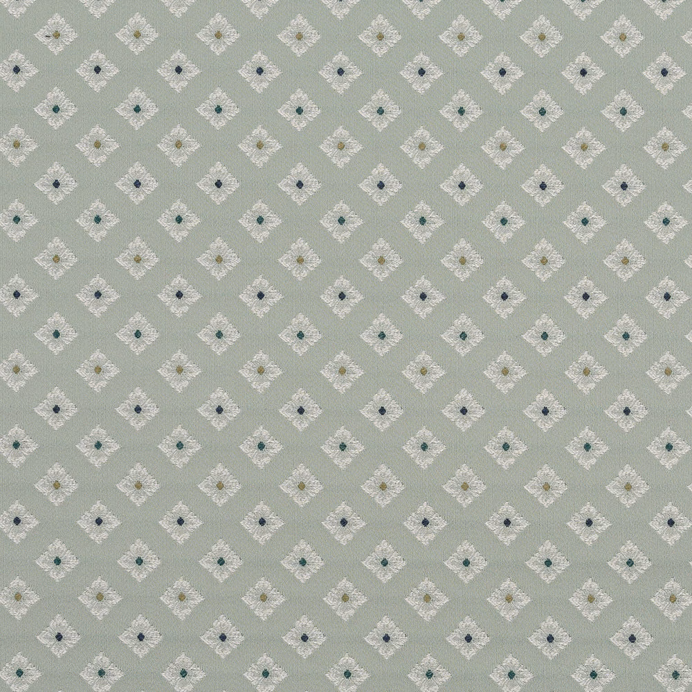 Soft celadon green fabric with small white diamond motif and tiny coloured centres