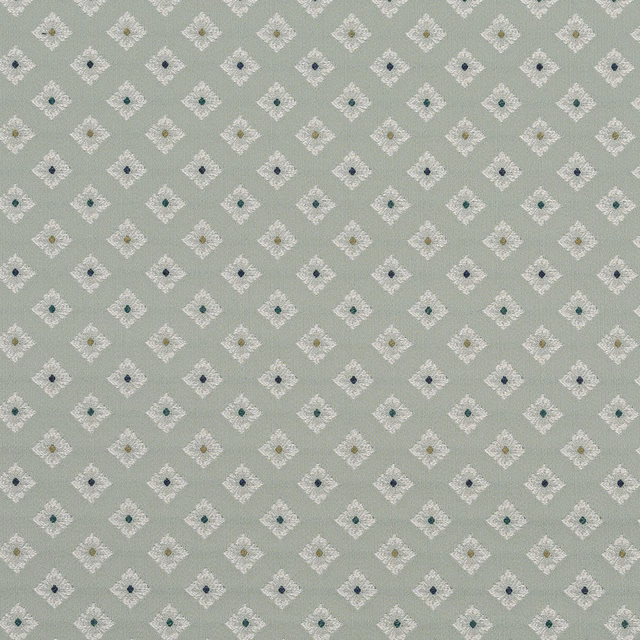 Soft celadon green fabric with small white diamond motif and tiny coloured centres