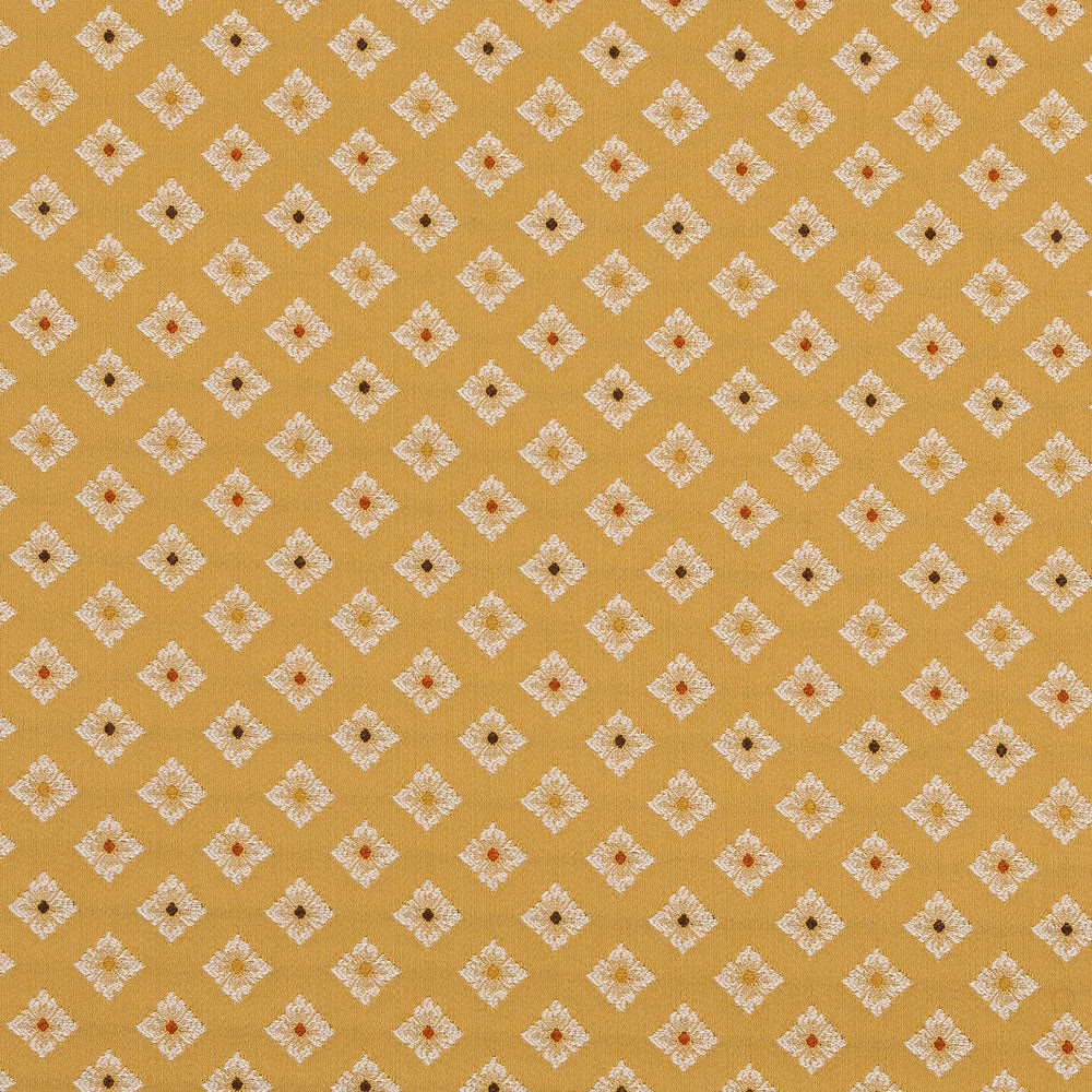 Mustard-gold woven fabric with small ivory diamond motifs and tiny dark centres