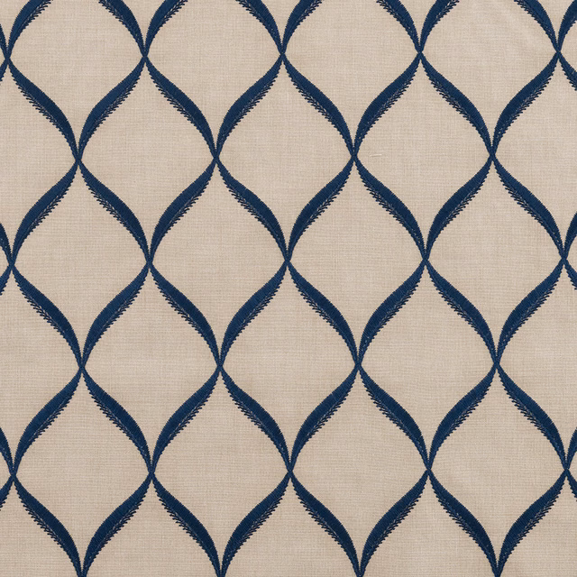 Blue indigo lattice pattern on a pale woven fabric background
