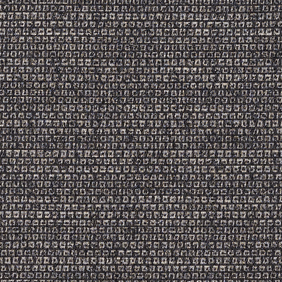 Close-up of charcoal black woven fabric with tiny ivory geometric flecks