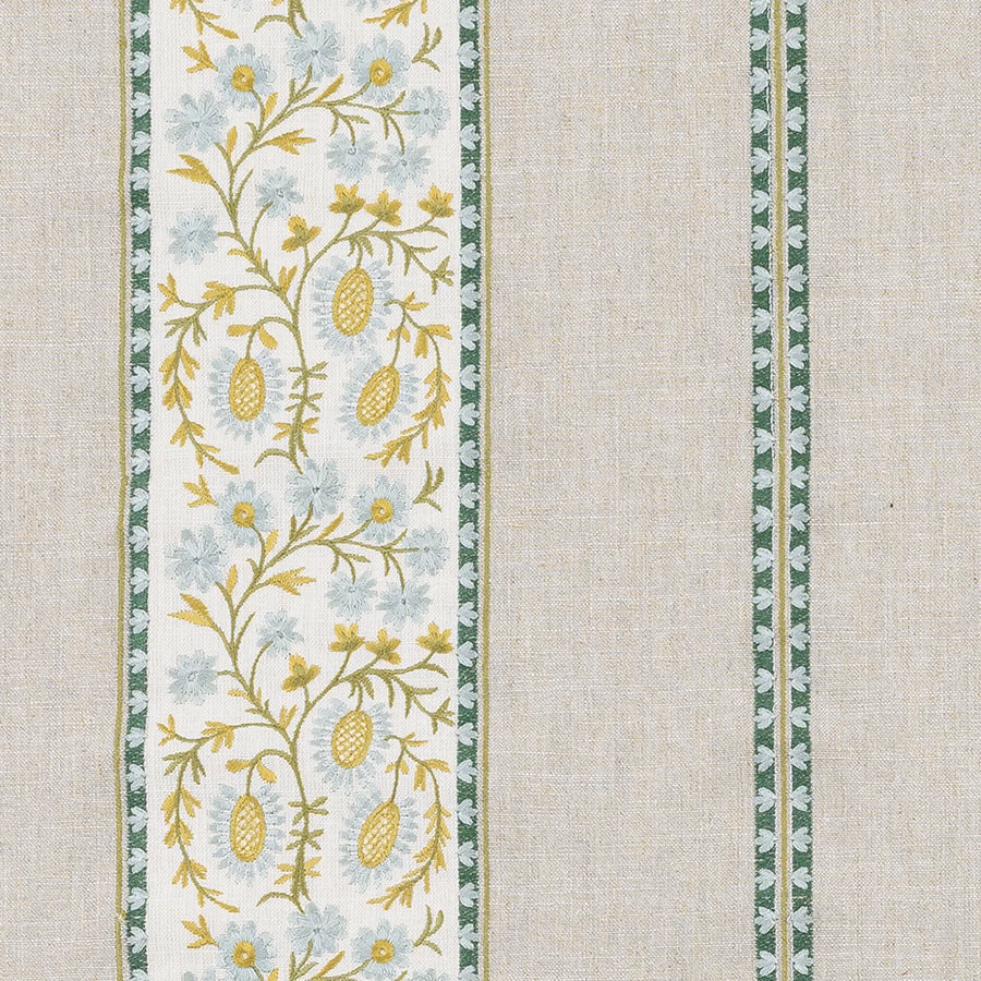 Cream woven fabric with jade green striped borders and trailing yellow floral motif