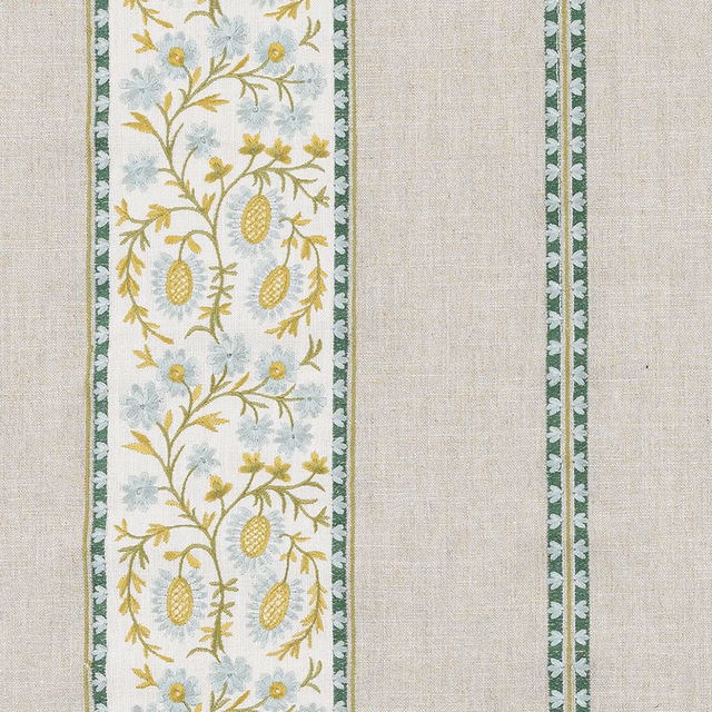 Cream woven fabric with jade green striped borders and trailing yellow floral motif