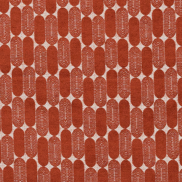 Brick red abstract woven fabric with rounded oval motifs on a pale ground
