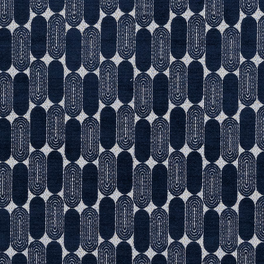 Indigo woven fabric with repeating oval geometric motif on pale ground