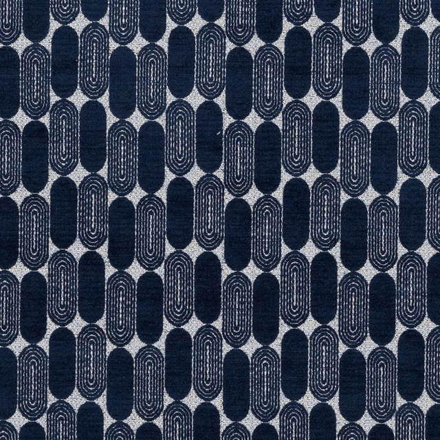 Indigo woven fabric with repeating oval geometric motif on pale ground