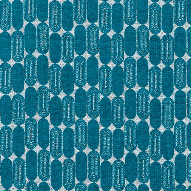 Teal geometric fabric with rounded vertical capsule motifs on a pale ground