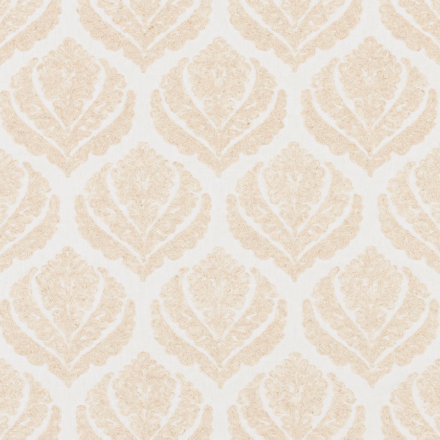 Cream damask fabric with soft ivory woven motif on a pale ground