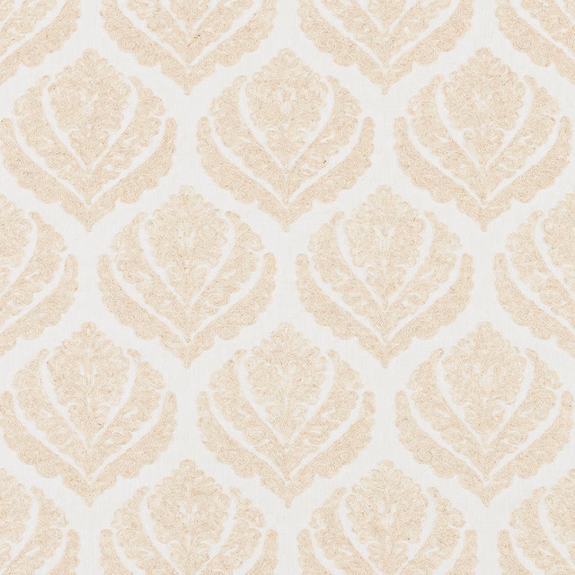 Cream damask fabric with soft ivory woven motif on a pale ground