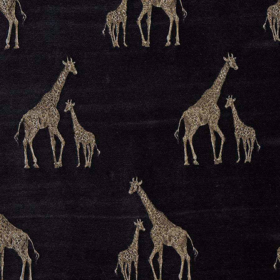 Black fabric swatch with large gold giraffe motif and soft woven texture