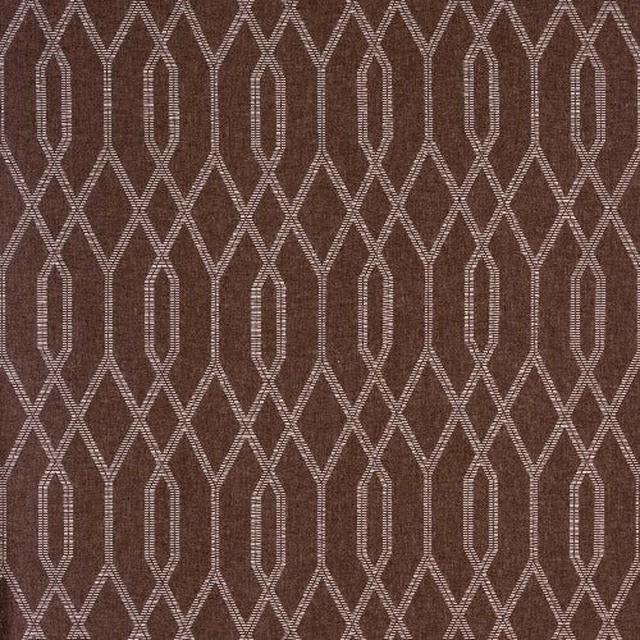 Dusty blush geometric woven fabric with elongated diamond and oval pattern on a warm brown ground