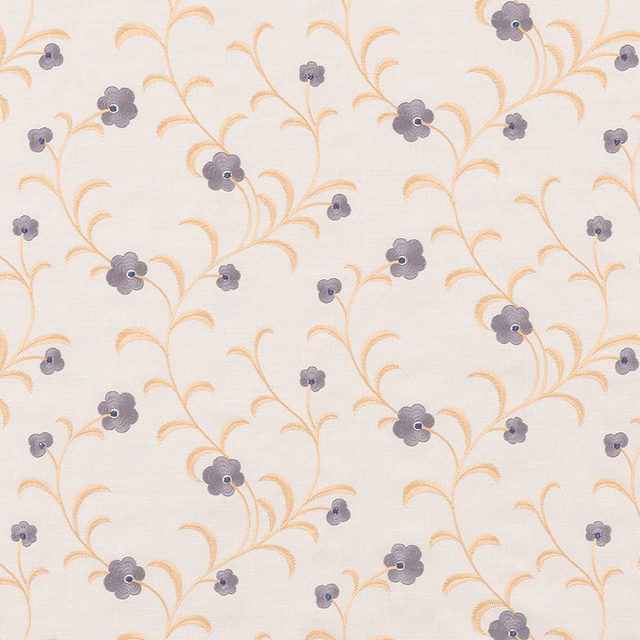 Creamy floral fabric with lilac blossoms and honey-gold trailing vines