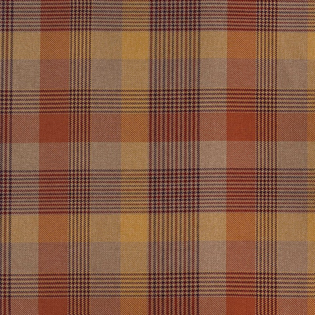 Warm terracotta and mustard tartan check fabric with woven texture