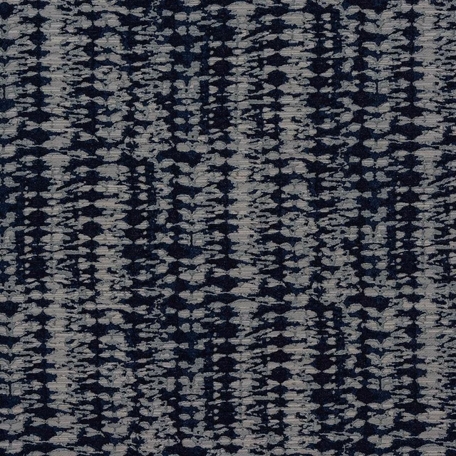 Close-up of indigo and grey woven stripe fabric with textured, irregular marks
