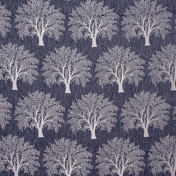 Indigo woven fabric with repeating pale tree motif and textured ground