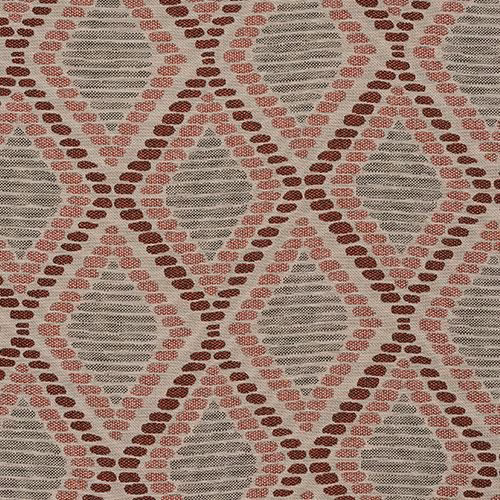 Close-up of geometric woven fabric with brick red diamonds and sage ovals
