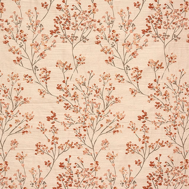 Cream ground fabric with delicate branch motif in burnt orange and peach