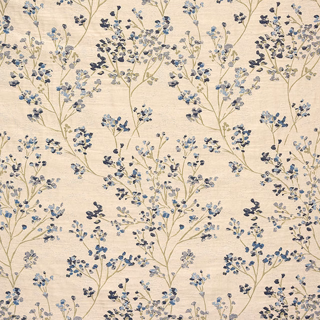 Ivory fabric with delicate indigo and blue flowering branches
