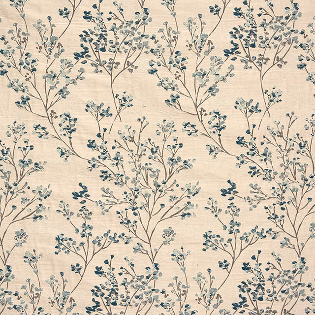 Cream fabric swatch with delicate teal botanical branches and small leaves