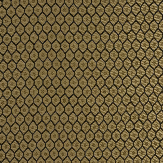 Close-up of a taupe and dark brown geometric woven fabric with small linked diamond motifs.