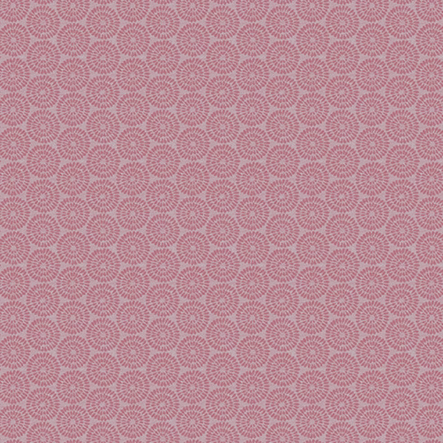 Soft blossom pink woven fabric with tiny repeating floral rosettes